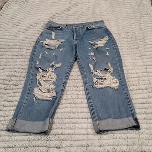 Medium wash button down hi-rise distressed Carmar jeans size 28